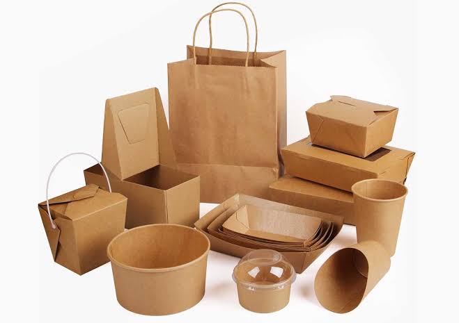 Protective packaging inserts and custom cartons in a warehouse
